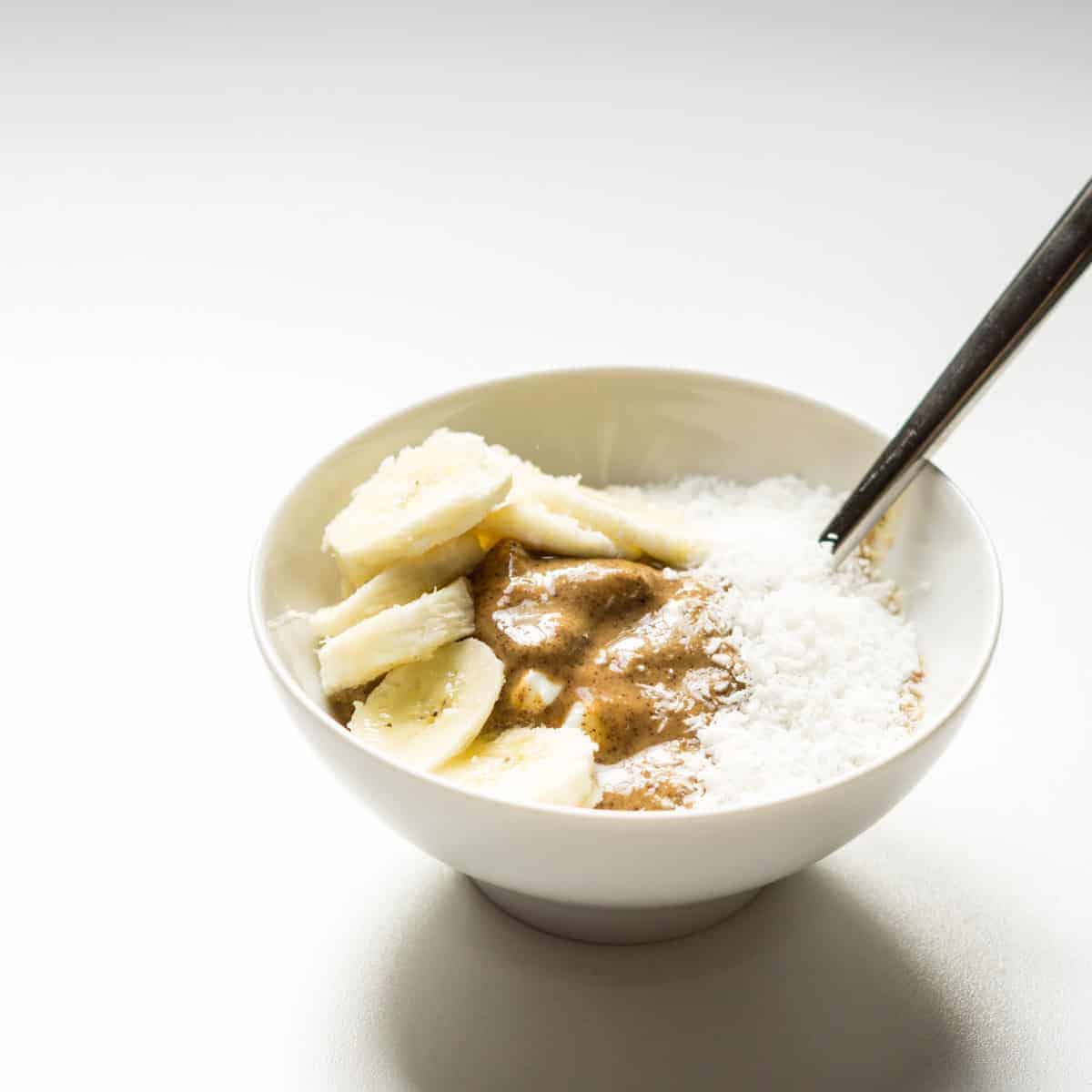 low sugar yogurt with bananas, almond butter, and coconut