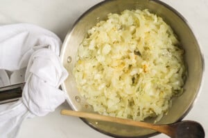 sauteed onions and garlic in a frying pan