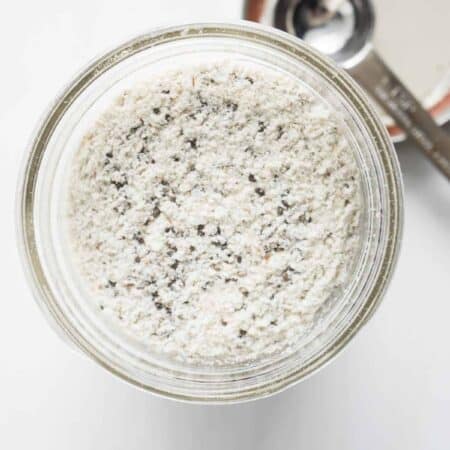 topdown view of a mason jar filled with a smoothie booster recipe