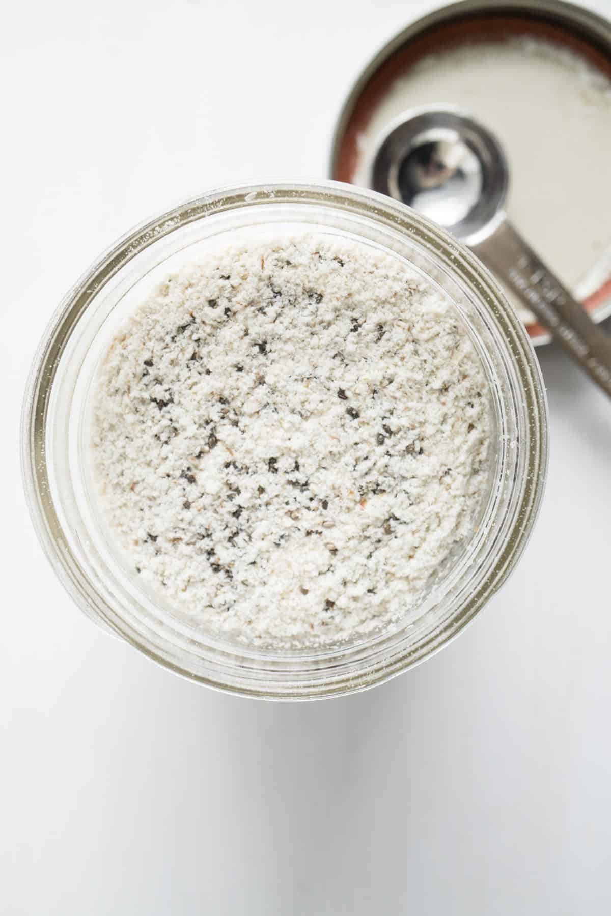 topdown view of a mason jar filled with a smoothie booster recipe