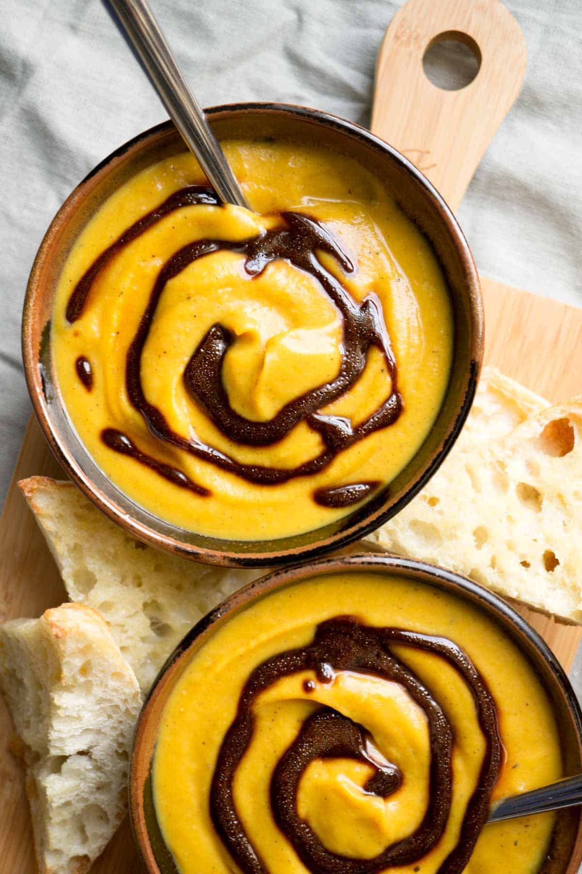 carmelized apple and butternut squash soup with balsamic drizzle