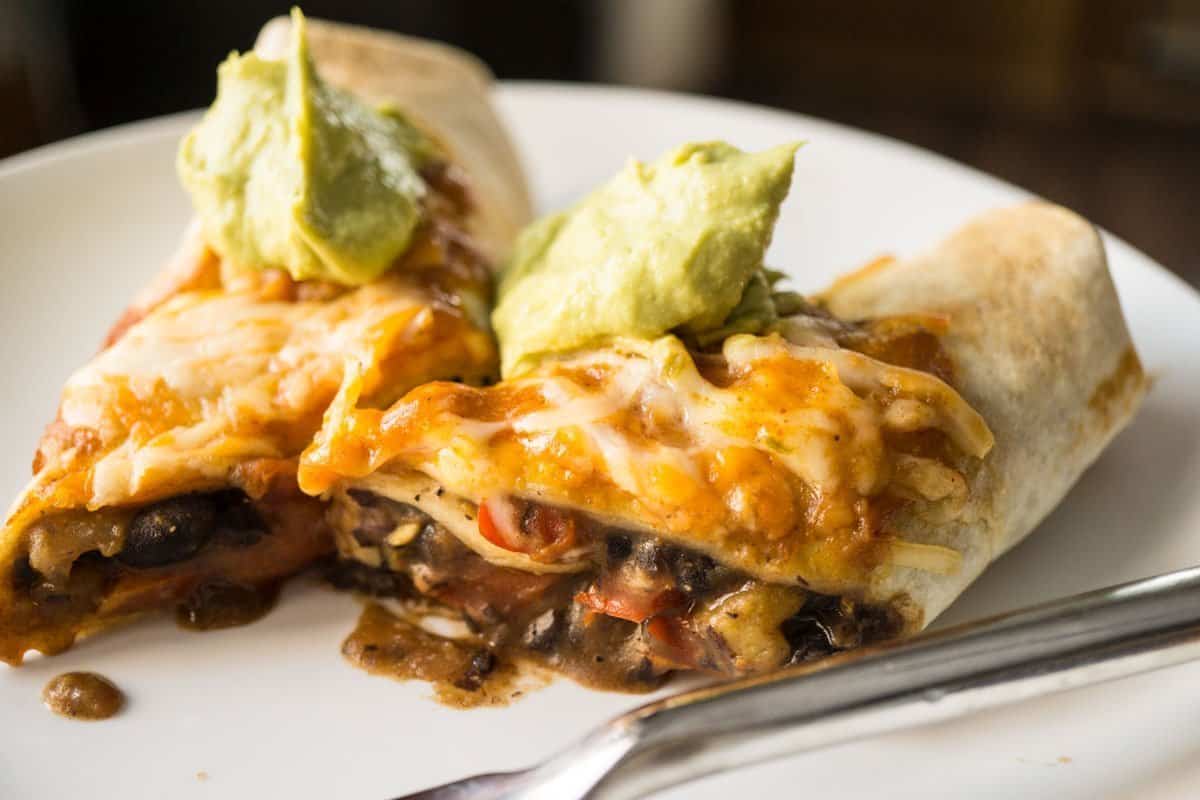 Black Bean Enchiladas with Avocado Cream Sauce 