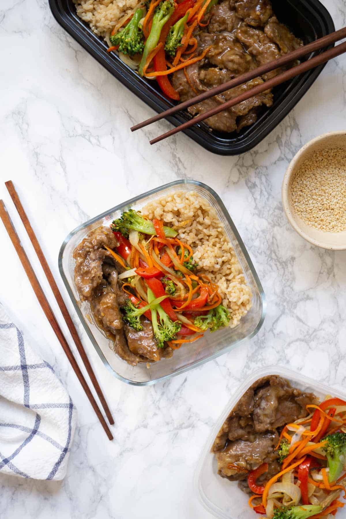 Overhead view of three bowl of Sheetpan Ginger Beef and Veggies