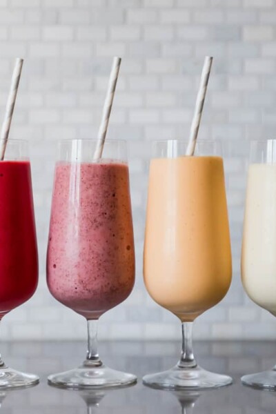 Four glass of four different types of summer smoothies. Photography by Gabrielle Touchette