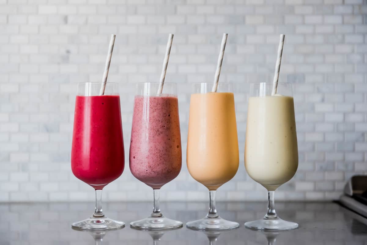 Four glass of four different types of summer smoothies. Photography by Gabrielle Touchette