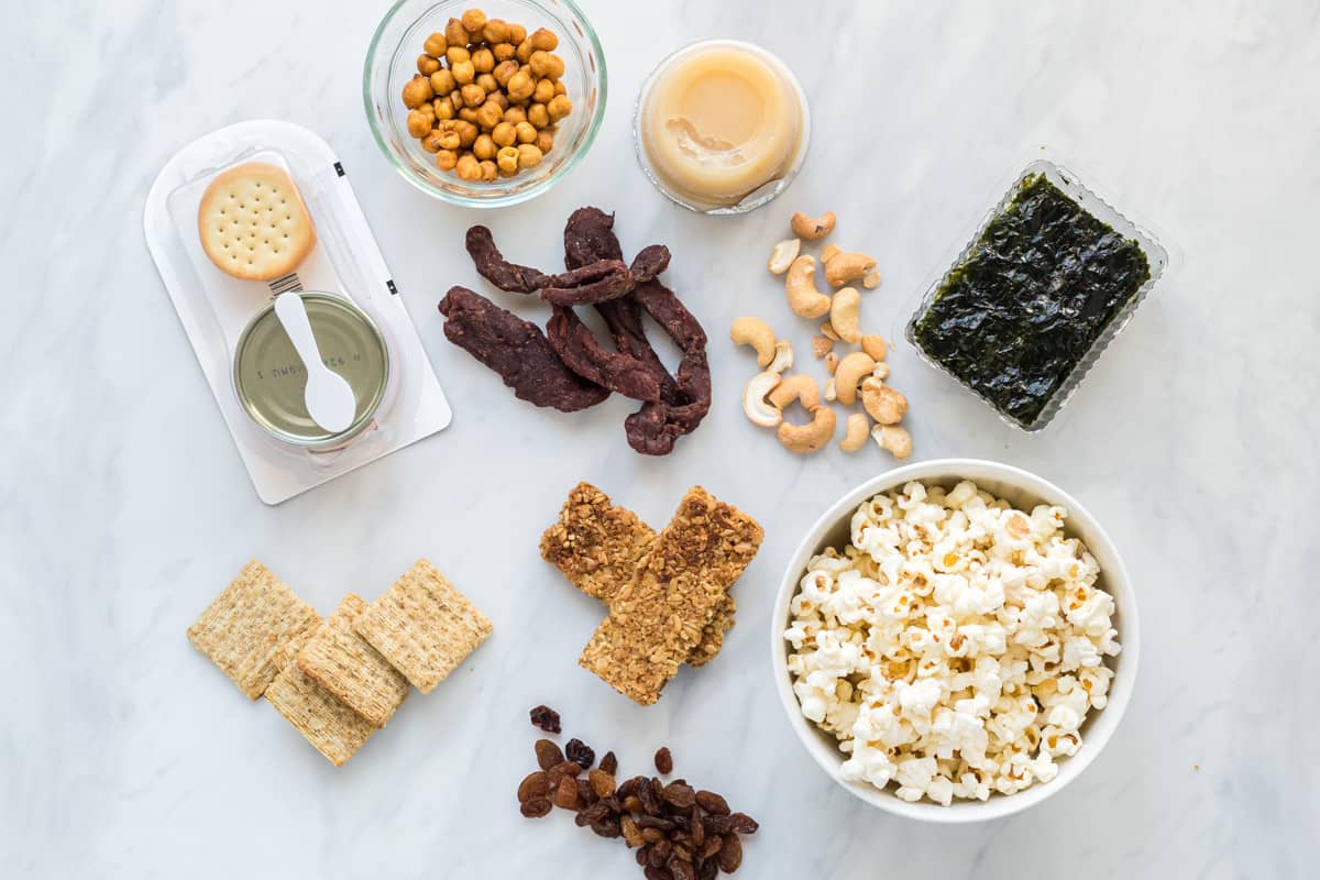 A flatlay image of a Dietitian's top choices for packaged snacks