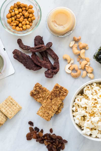A flatlay image of a Dietitian's top choices for packaged snacks
